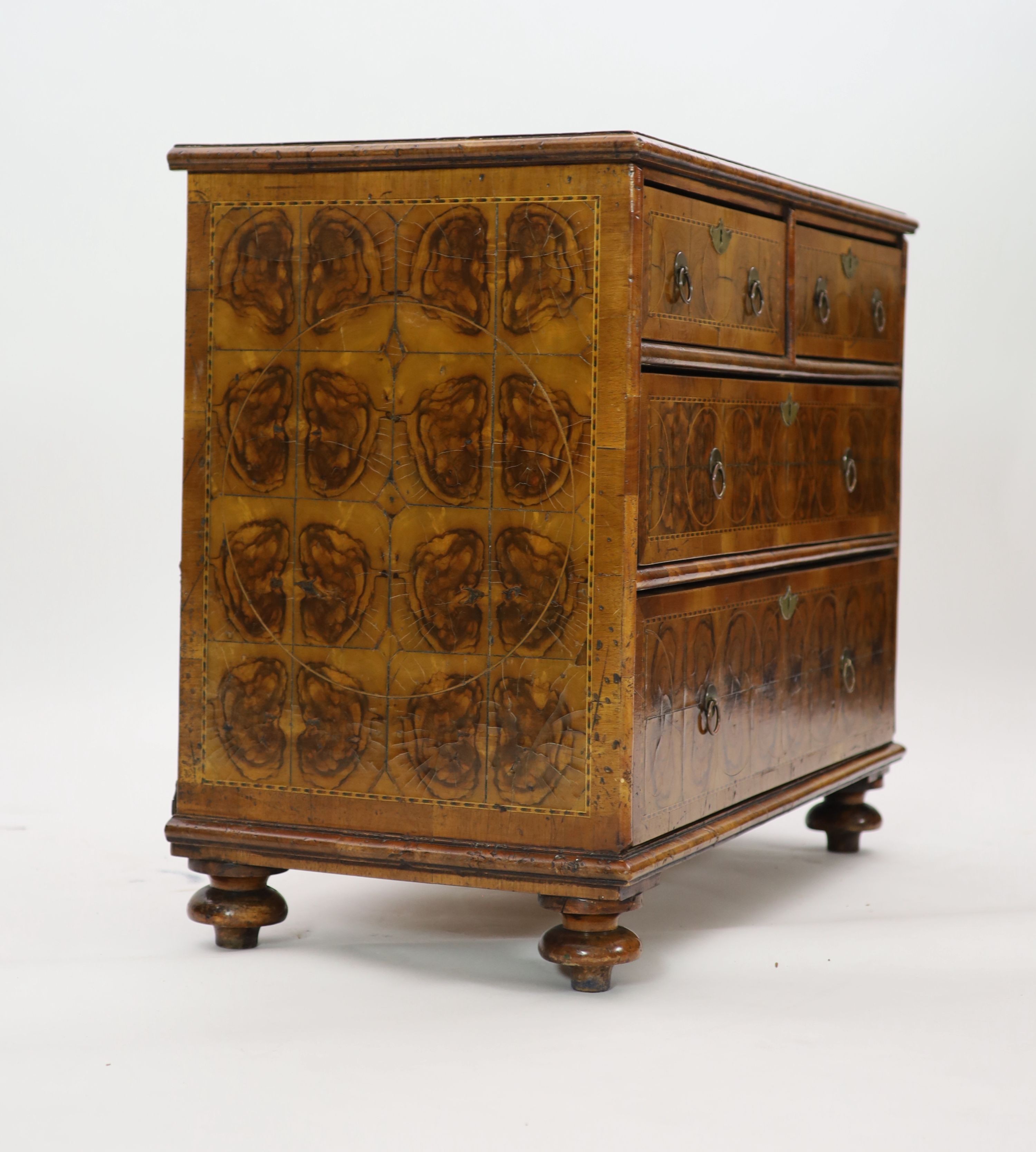 A William III and later oyster olive wood veneered chest, W.94cm D.48cm H.76cm